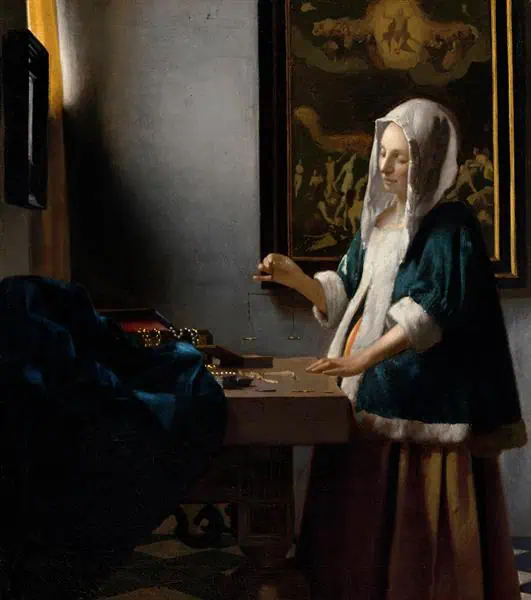 woman holding a balance